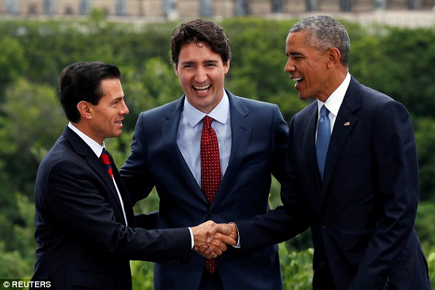 Obama trudeau shaking hands